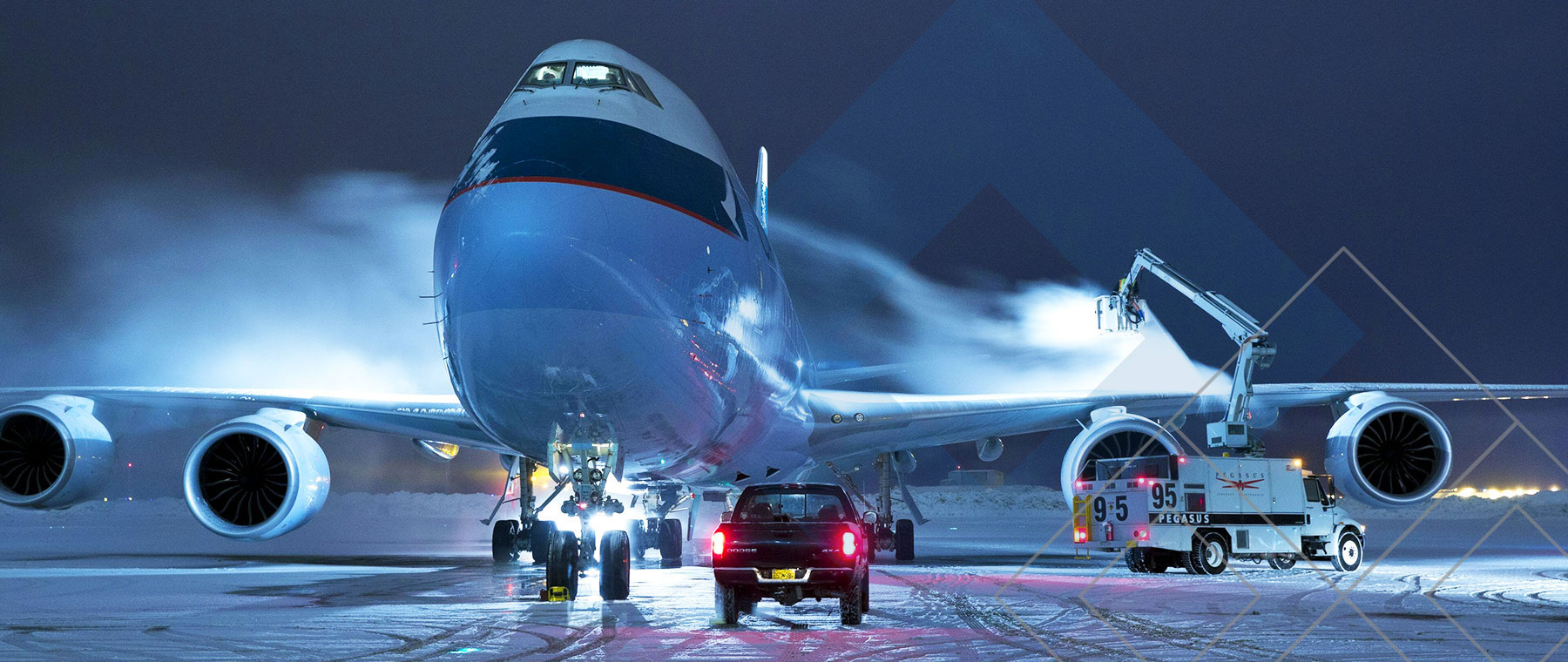 Airplane on runway in snow.